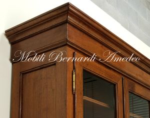 Removable classic style bookcase made of walnut wood with closed and glass doors